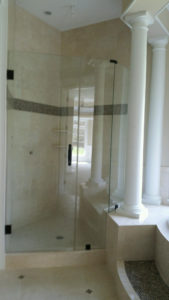a custom glass shower wall and door