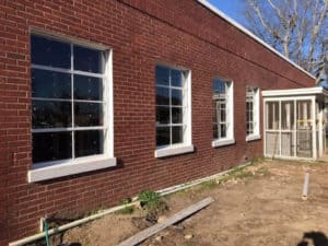 new glass window panes installed at a renovated school